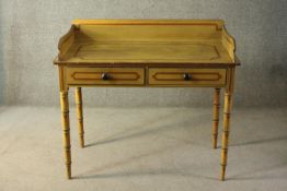 A Victorian yellow painted washstand, with a three quarter gallery back, over two short drawers,