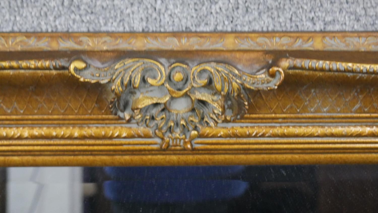 A rectangular gilt framed wall mirror, with a bevelled mirror plate, the frame with moulded - Image 4 of 5