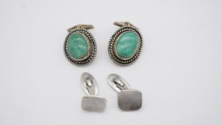 Two sets of silver cufflinks. One set with oval Turquoise cabochons with a combined approximate