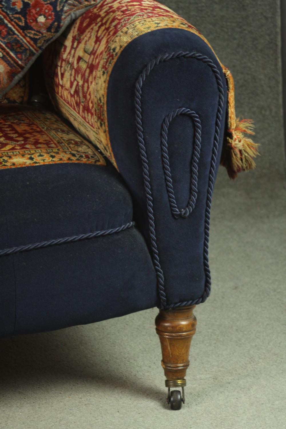 A late Victorian sofa, upholstered in blue velour, with sections of a Persian Sarouk rug to the - Image 6 of 8