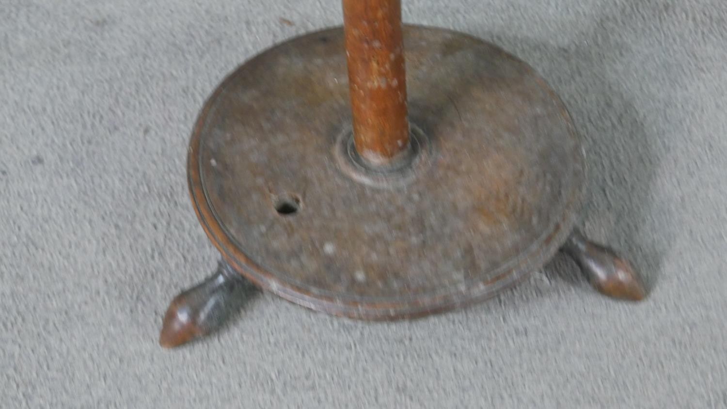 A 19th century spinning wheel in turned beech along with a wool spinners stand. H.178cm (largest) - Image 10 of 11