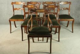 A set of seven William IV mahogany dining chairs, including six side chairs and one carver, the