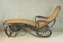 A late 19th/early 20th century Thonet style folding bentwood lounger, the back on a ratchet