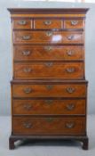 A George III mahogany and inlaid chest on chest, with three short over six long graduated drawers,