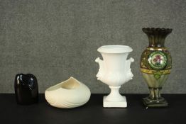A collection of ceramics, including a tube line decorated urn design vase, a twin handled white