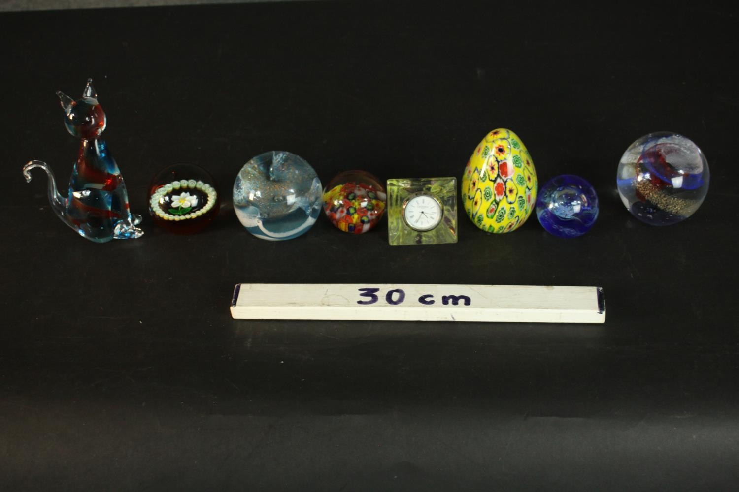 A collection of art glass paperweights, including a yellow Millefiori egg paperweight, a floral - Image 12 of 12
