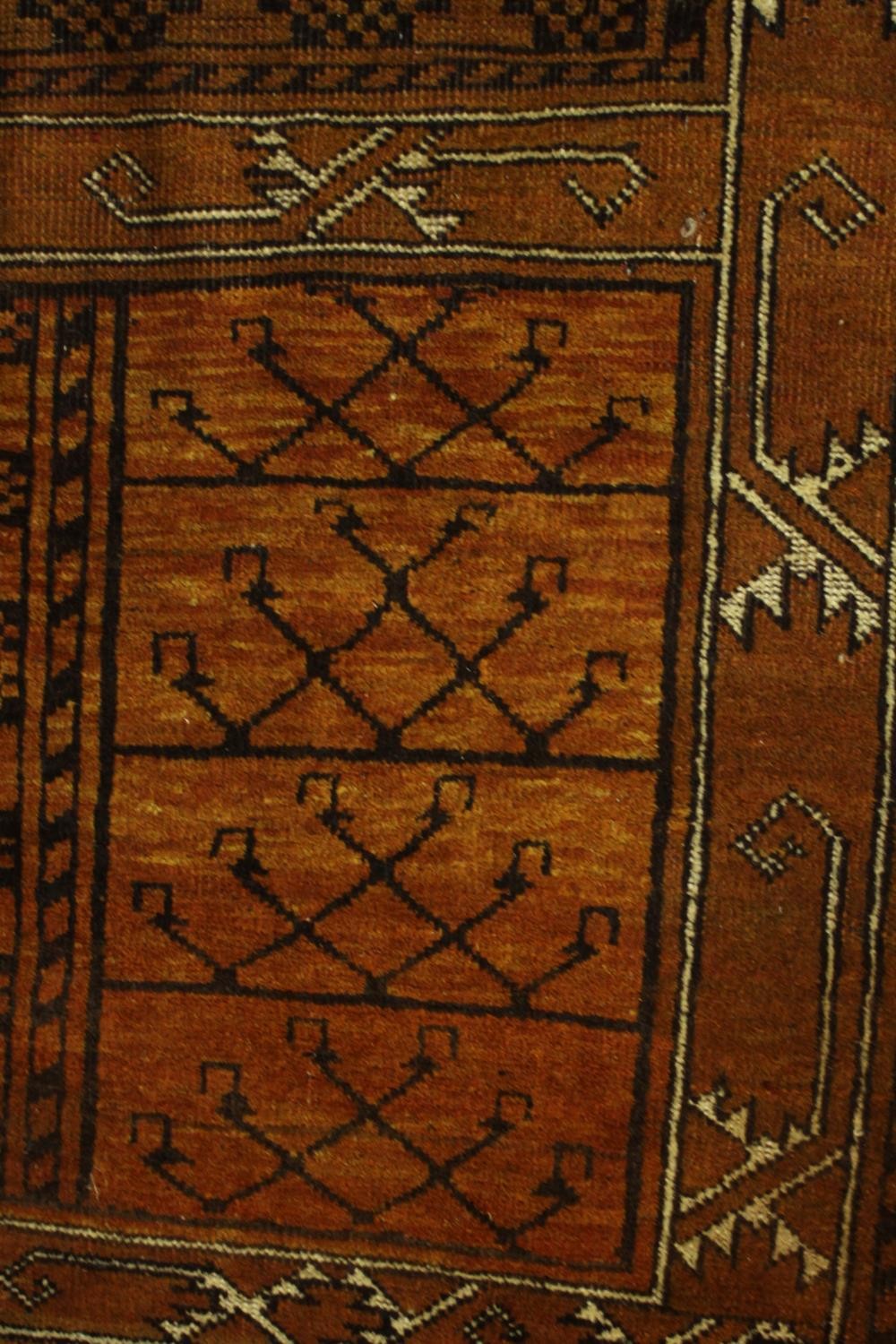 A gold ground hand made Afghan rug. L.215 W.150cm - Image 4 of 6