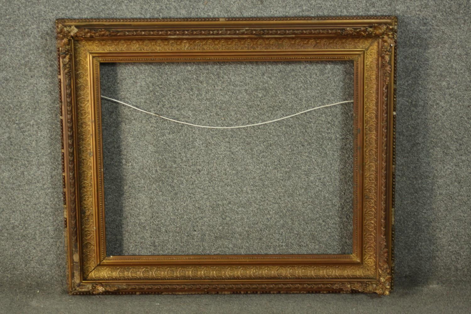 A 19th century gilt wood and gesso frame. H.68 W.80cm.