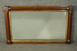 A Regency rosewood overmantel mirror, the rectangular mirror plate flanked on three sides with