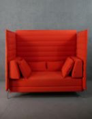 A contemporary Vitra Alcove High Back two seater sofa, upholstered in red fabric, with loose