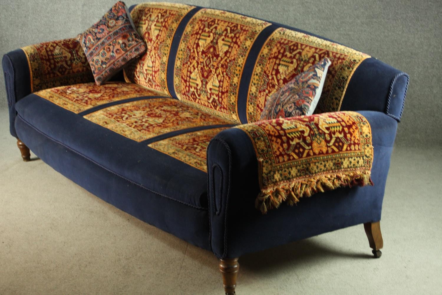 A late Victorian sofa, upholstered in blue velour, with sections of a Persian Sarouk rug to the - Image 8 of 8