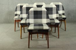 A set of six circa 1960's dining chairs, with grey check upholstered back and seat, on beech legs.