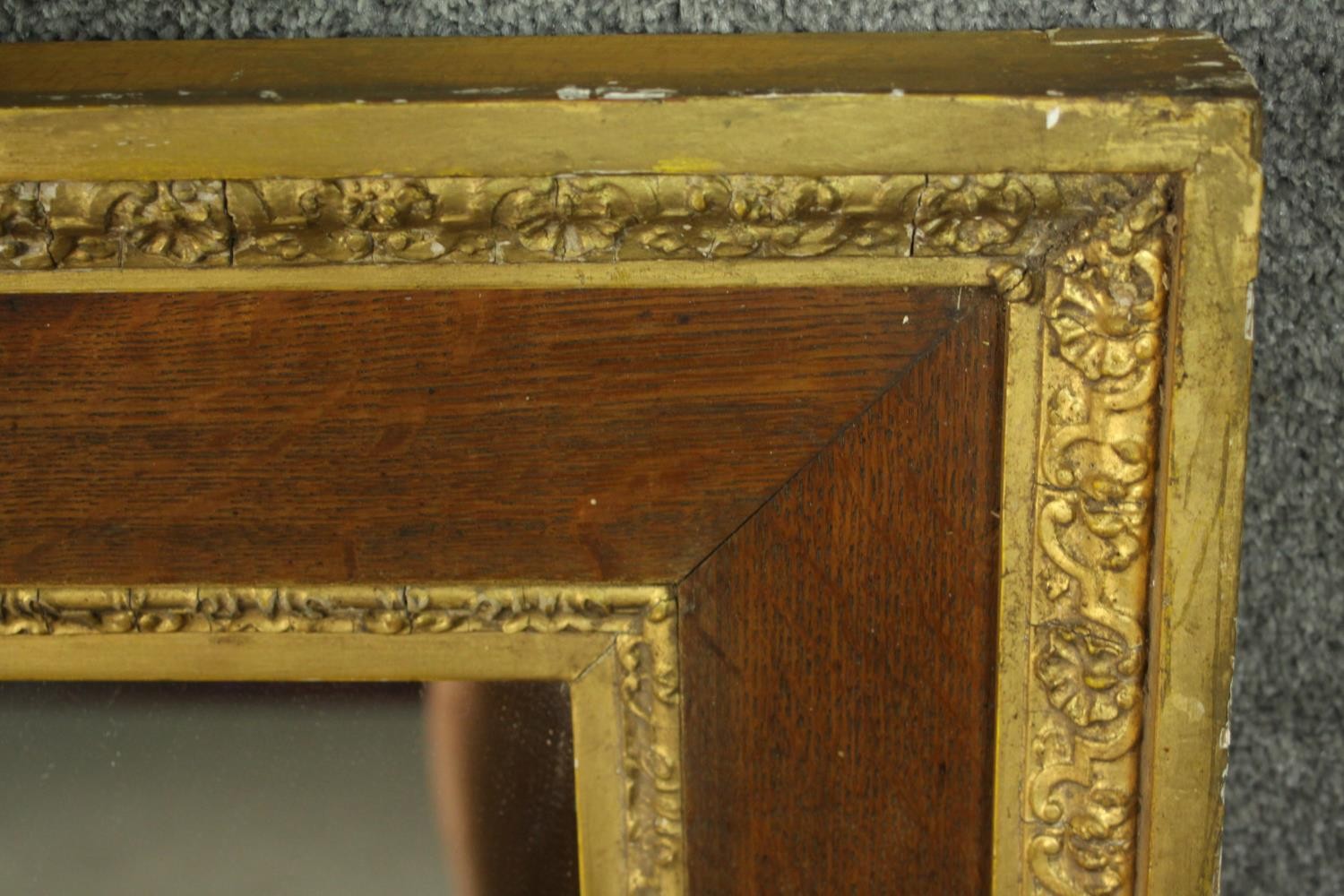 A 19th century oak and parcel gilt framed mirror, with a plain mirror plate, the frame with two - Image 5 of 6