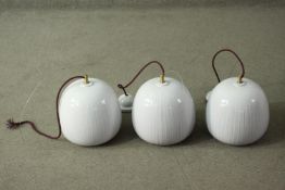 A set of three contemporary Gooseberry pendant ceiling lights, by Hand & Eye Studio, of ovoid