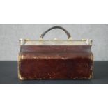 A vintage leather Gladstone bag with brass fittings. H.25 W.36 D.17cm