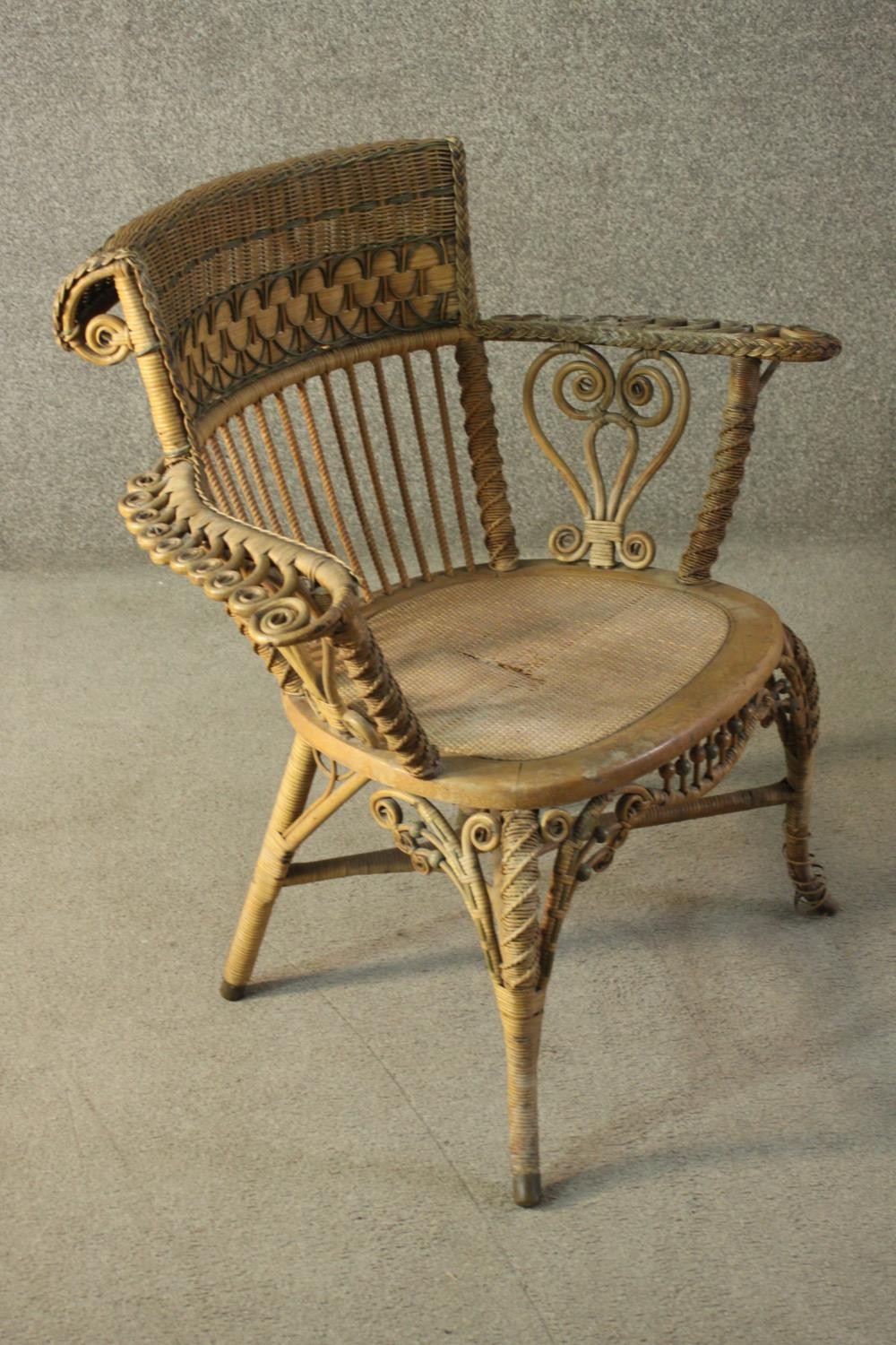 A late 19th/early 20th century wicker open armchair, with a rattan woven backrest, the arms with - Image 2 of 7