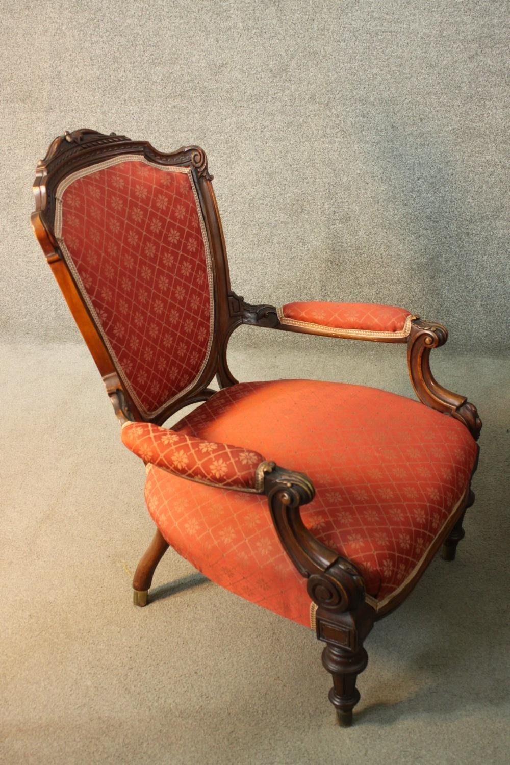 A late 19th century carved mahogany armchair in geometric floral upholstery on fluted tapering - Image 2 of 4