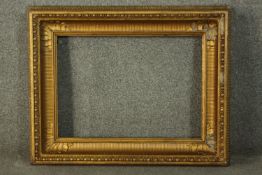 A 19th century gilt wood and gesso frame. H.60 W.77cm.
