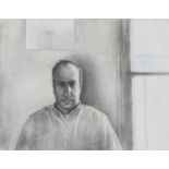 An unframed charcoal portrait of a man by a window, signed R. Levy. H.71 W.86cm (inc. mount)