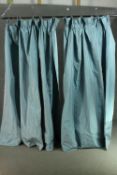 A pair of long blue and grey shot silk curtains. L.200 W.200cm approx.