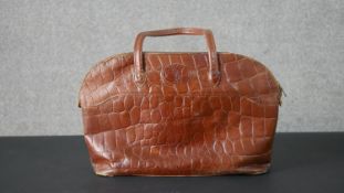A large Mulberry handbag in crocodile skin with tartan lining. H.30 W.48cm