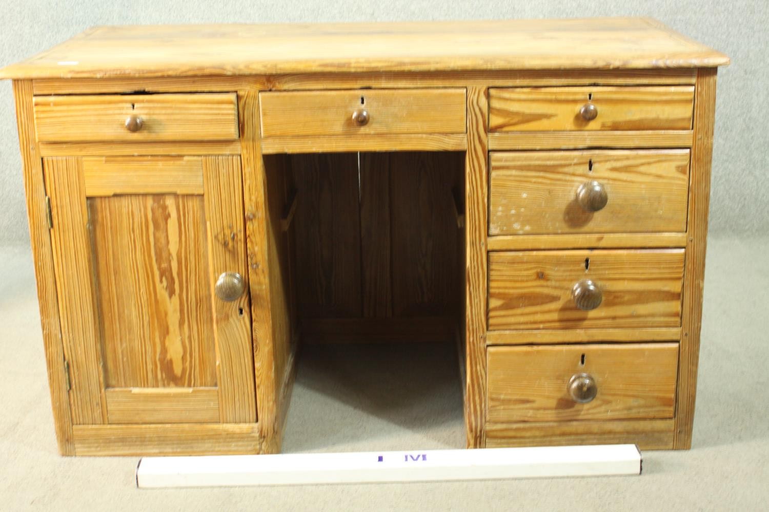 A Victorian pitch pine kneehole desk, with three short drawers, over a cupboard door to one - Image 2 of 8