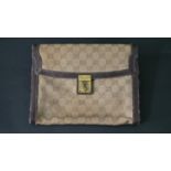 A vintage Gucci clutch handbag, marked Gucci, with dust bag. H.20 W.26cm