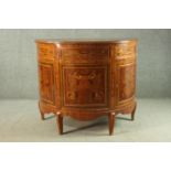 An Italian Sorrento ware marquetry inlaid bow front cabinet, with a single short drawer and two faux