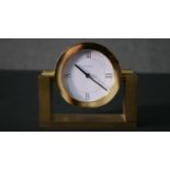 A solid brass Tiffany & Co quartz alarm clock. H.11 W.13 D.4cm