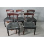 A set of five William IV mahogany bar back dining chairs, with a carved stylized fern backrest