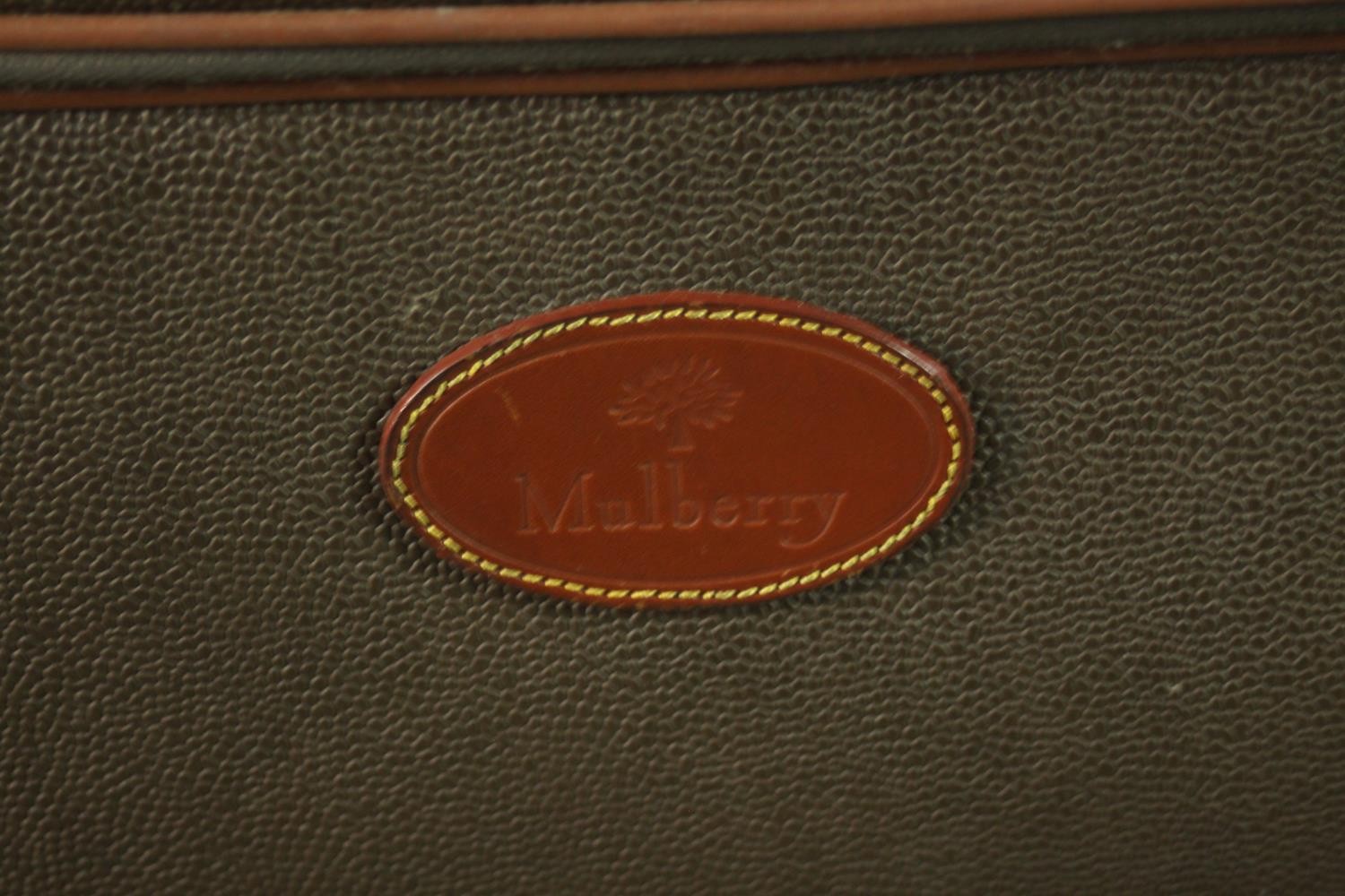 A Mulberry scotchgrain leather travelling case with wheels and spring loaded extending handle, - Image 3 of 8