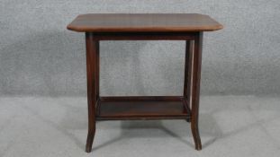 A circa 1900s fruitwood occasional table, the rectangular top with canted corners, over an