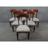 A set of six mahogany dining chairs, circa 1840, with bar backs, on carved reeded supports, over