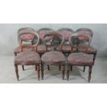 A harlequin set of seven various Victorian mahogany dining chairs, all upholstered in matching