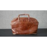 A large Mulberry handbag in crocodile skin with tartan lining. H.30 W.48cm