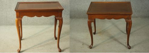 A pair of George III style mahogany occasional tables, of rectangular form, the top with a moulded