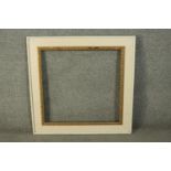 A 19th century white painted and gesso frame. H.83 W.83cm.