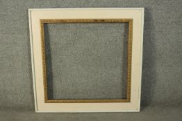 A 19th century white painted and gesso frame. H.83 W.83cm.