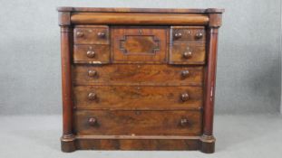 A William IV flame mahogany Scottish chest, with a cushion drawer over a hat drawer, flanked by