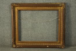 A 19th century gilt wood and gesso frame. H.70 W.80cm.
