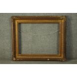 A 19th century gilt wood and gesso frame. H.70 W.80cm.