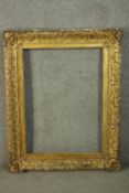 A 19th century gilt wood and gesso frame. H.102 W.86cm.