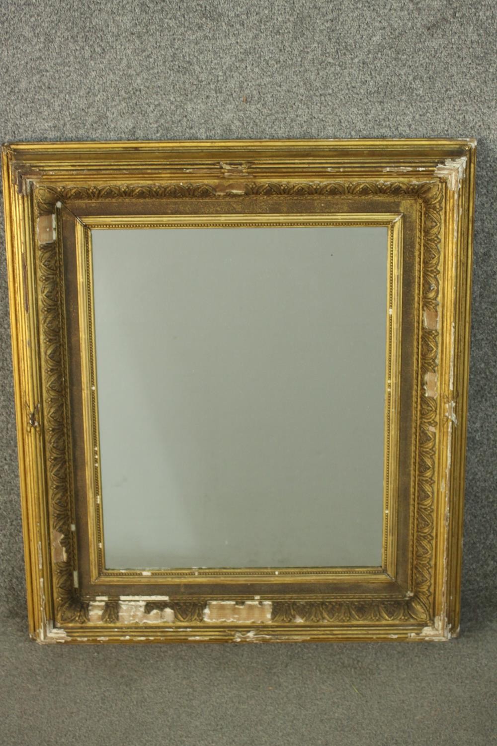 A 19th century gilt wood and gesso frame. H.75 W.65cm.