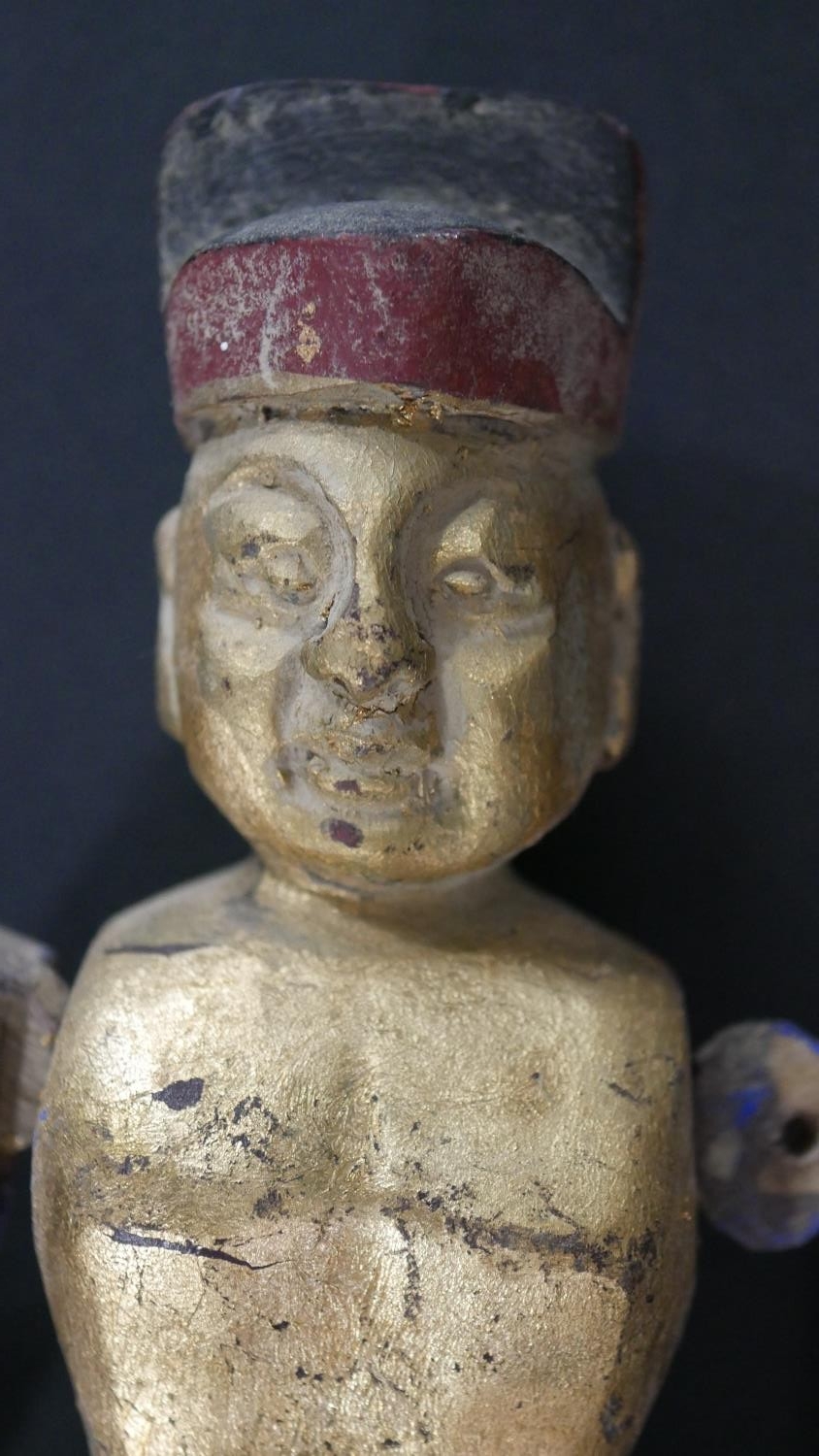 A 19th century Chinese painted and gilded temple fertility doll (arm loose but present) along with a - Image 3 of 12