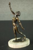 Gyula Maugsch (Hungarian, 1882-1946)- an Art Deco bronze female nude, holding a sphere aloft.
