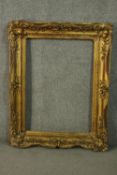 A 19th century gilt wood and gesso frame. H.98 W.77cm.
