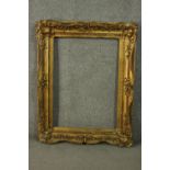 A 19th century gilt wood and gesso frame. H.98 W.77cm.