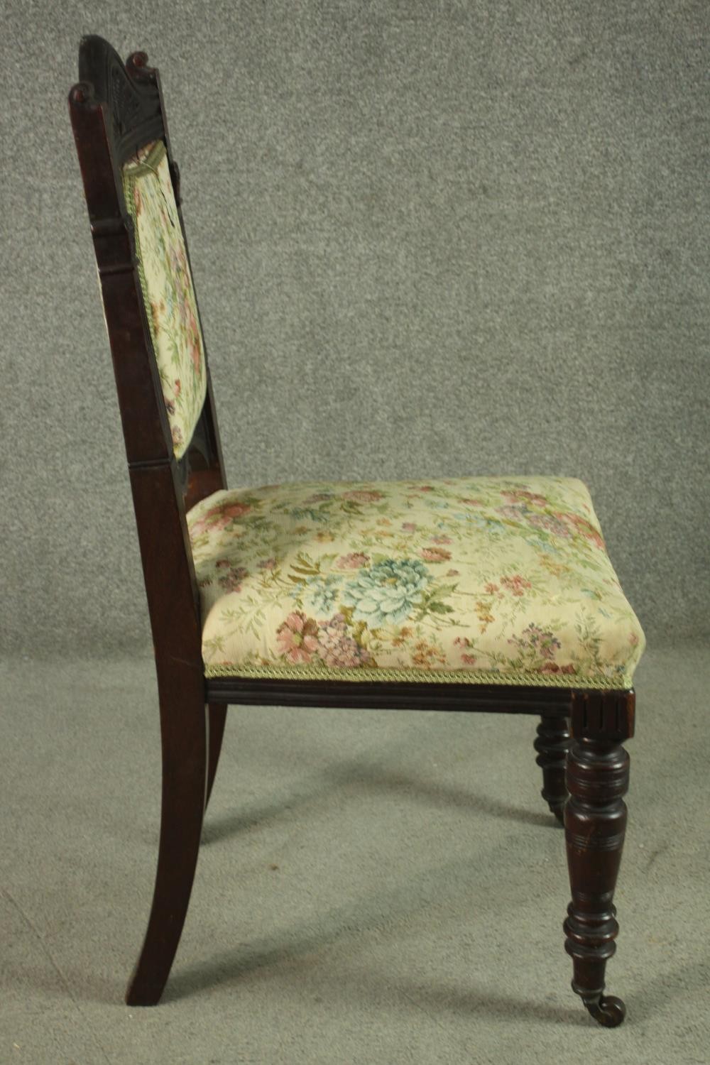 A set of six late 19th century dining chairs including two carvers and four side chairs, with a - Image 4 of 12