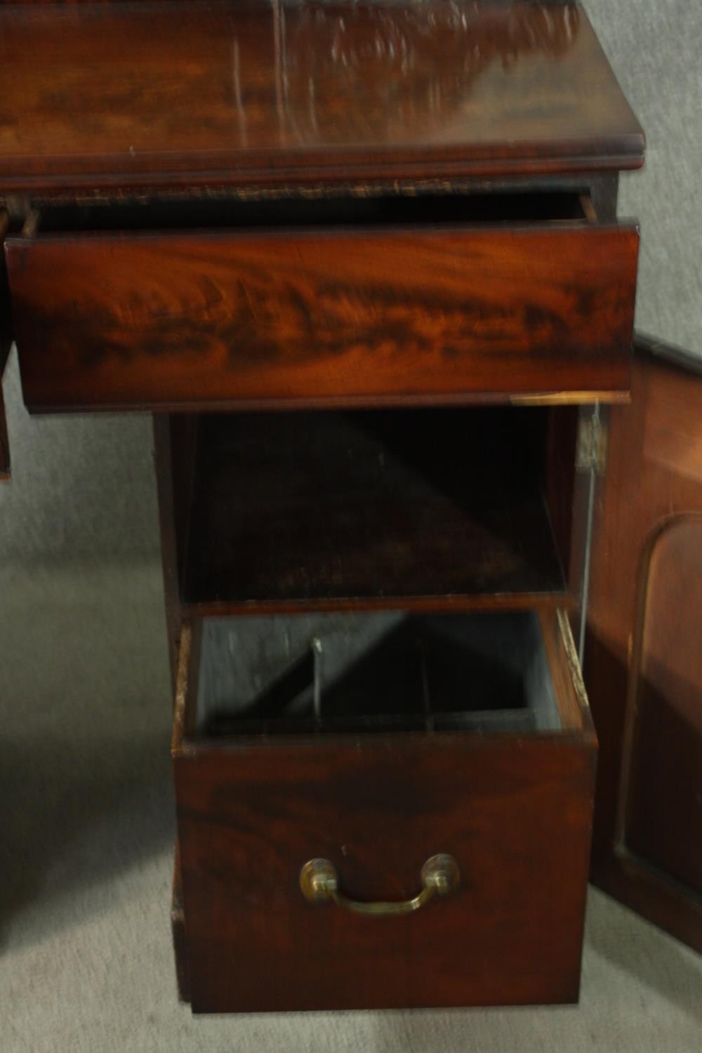 A William IV flame mahogany pedestal sideboard, the rectangular gallery back flanked by ornately - Image 7 of 10