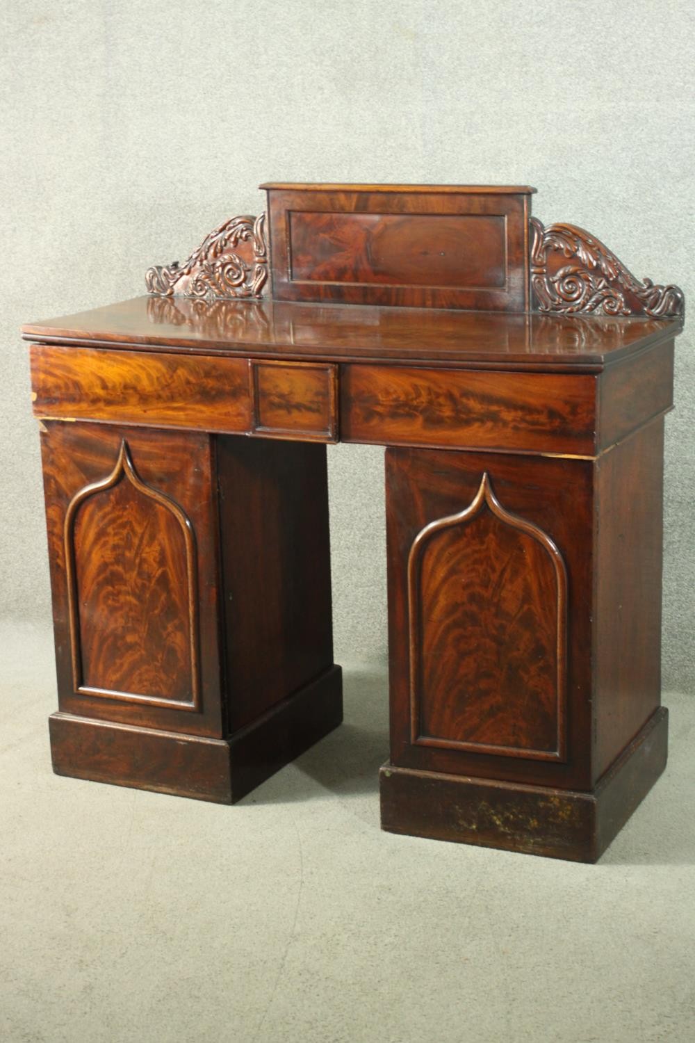 A William IV flame mahogany pedestal sideboard, the rectangular gallery back flanked by ornately - Image 10 of 10